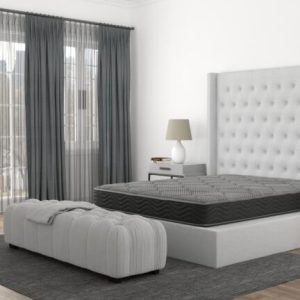 Modern bedroom with stylish furniture and natural light.