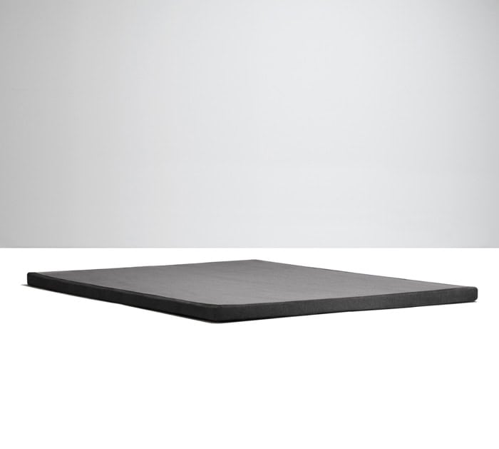 A flat, rectangular black mattress topper on a white surface with a plain gray background. The topper has a smooth texture and minimal thickness, designed to provide additional comfort and support on your Southerland 9" Semi Flex Box Spring mattress.