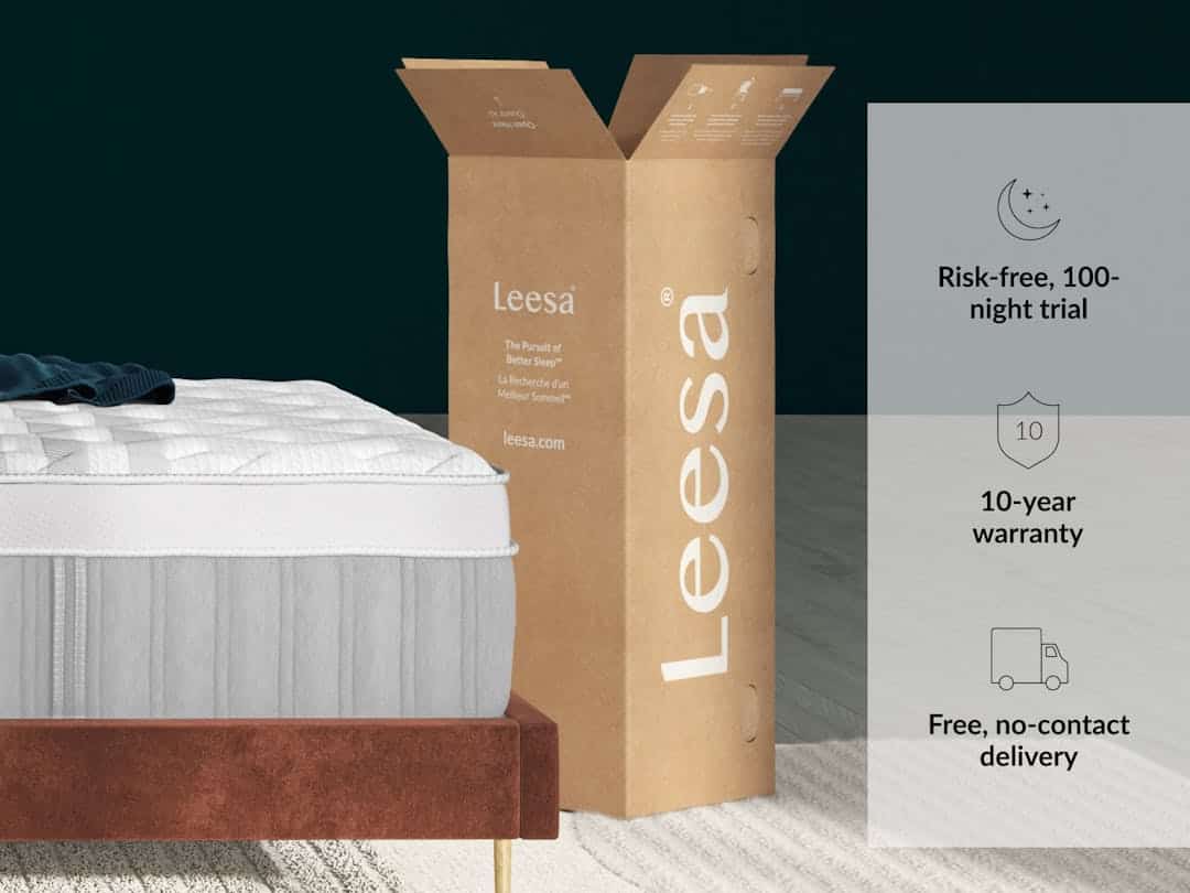 A white Sapira Chill Hybrid Mattress is partially shown on a brown bed frame next to an upright cardboard box labeled "Leesa Sapira." Text on the right side of the image states: "Risk-free, 100-night trial," "10-year warranty," and "Free, no-contact delivery," with corresponding icons.