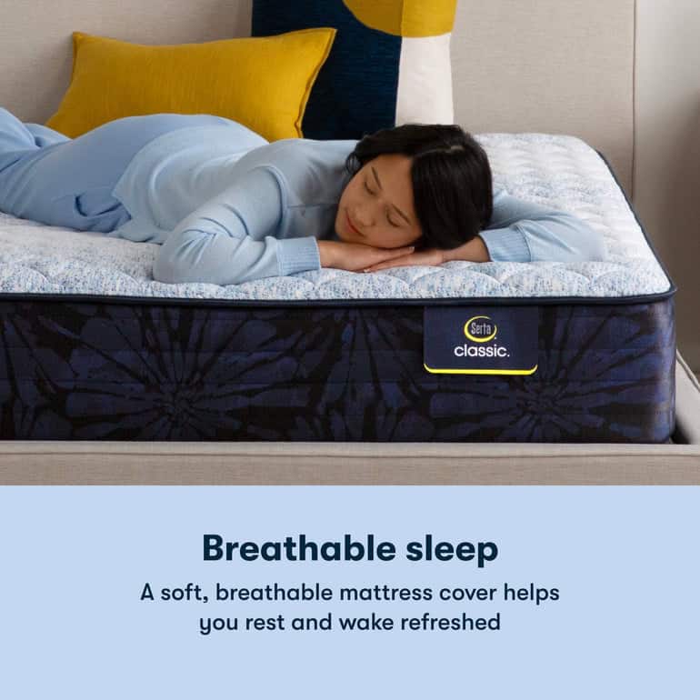 A person wearing light blue pajamas is lying face-down and sleeping on a bed with a white and blue patterned mattress. Below the image, there's text that reads, "Breathable sleep with the Serta Classic Mattress: Dorian Plush Euro Top. A soft, breathable mattress cover helps you rest and wake refreshed.
