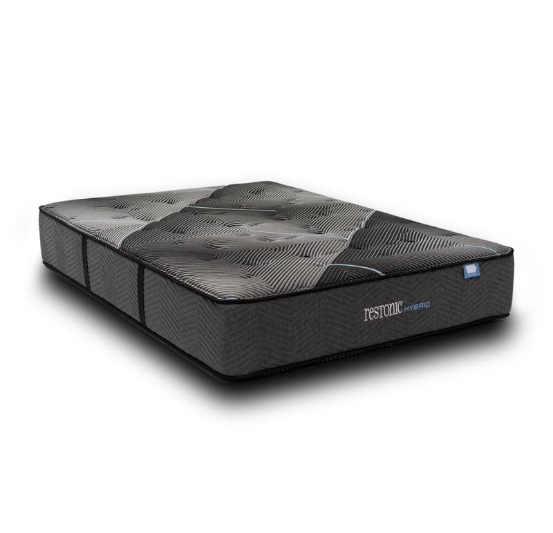 The Restonic Maquoketa Hand-Tufted Extra Firm mattress showcases a rich, dark color complemented by a chic geometric pattern on its top surface. The brand name "Restonic" is prominently displayed on the side. This hand-tufted mattress offers a quilted, cushioned surface that maintains plush aesthetics while providing extra firm comfort for exceptional support.