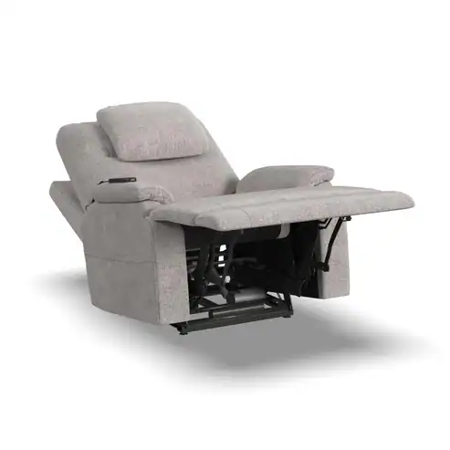 A light gray Zecliner Model 2 Petite — Power Sleep Chair is shown extended with the footrest raised and backrest tilted back, displaying the black metal reclining mechanism underneath.
