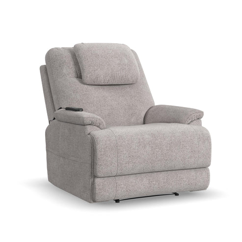 The Zecliner Model 2 Petite Power Lift Recliner is a plush, light gray chair with padded armrests, a high backrest, an attached headrest pillow, and a side control panel for easy recline adjustment.