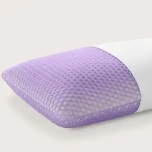 The Purple Harmony™ Pillow is rectangular with a purple honeycomb-patterned surface and a white end, shown against a plain light background.