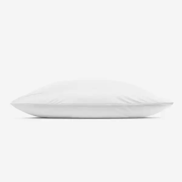 The Hyper Silk Performance Pillowcase, in white with a smooth, plain surface, is displayed lying flat on a light background and viewed from the side.