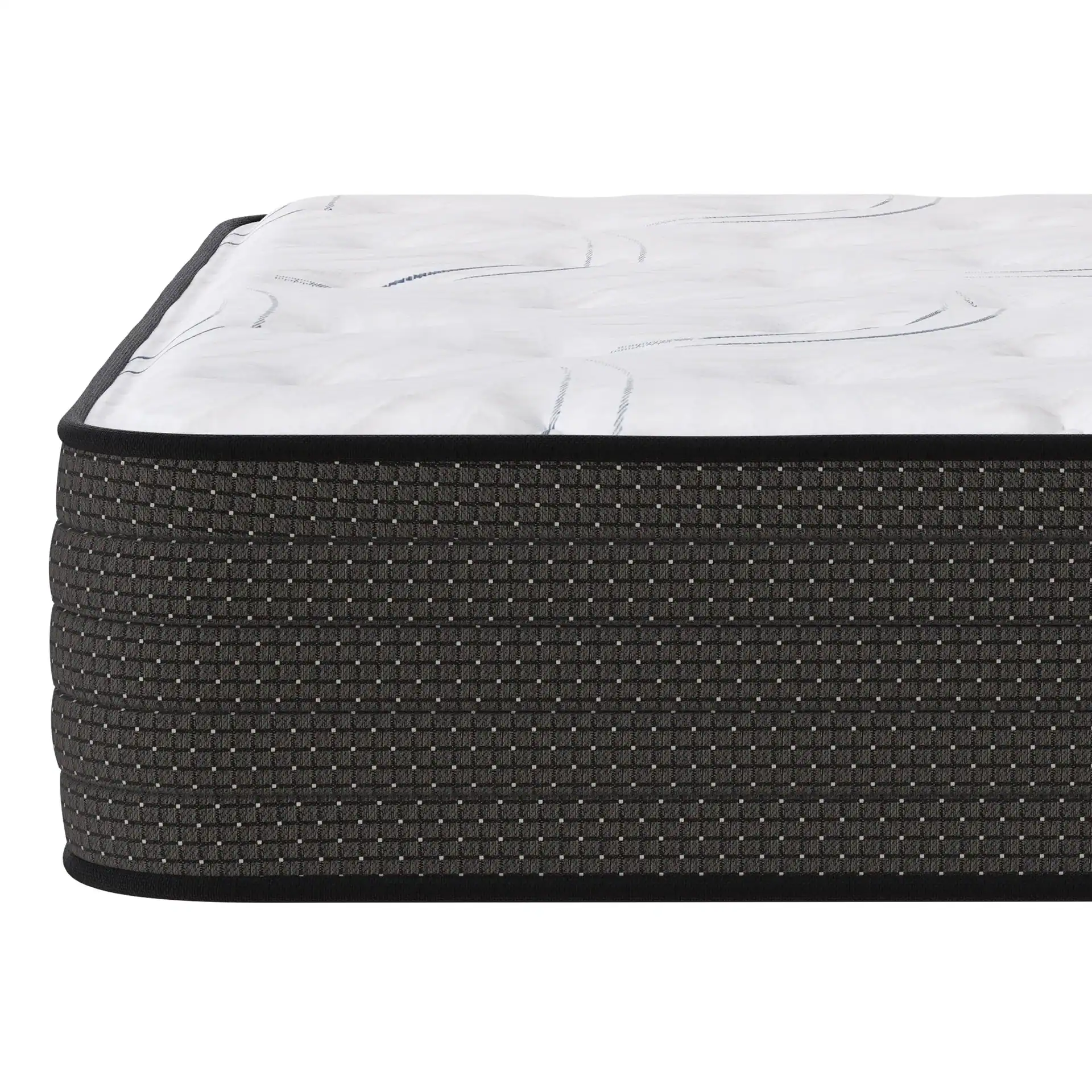 A close-up of Southerland's Prairie Extra Firm mattress highlights its quilted white top with subtle patterns and a textured dark gray side panel finished with a black edge trim.