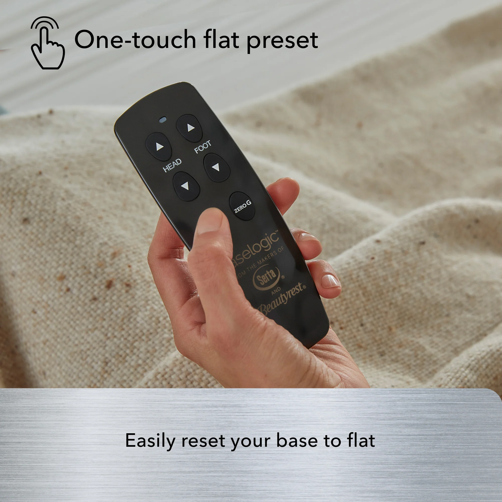 A hand holds a black remote with arrow buttons for the Baselogic™ Silver Adjustable Base. The text above reads "One-touch flat preset," and below, "Easily reset your base to flat." A textured surface appears in the background.