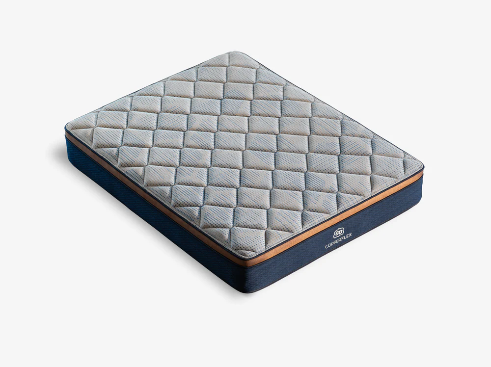 A thick, rectangular CopperFlex Hybrid 12" mattress with a quilted checkered gray and blue top, dark blue sides, and a brown accent stripe along the upper edge, shown on a plain white background.